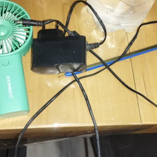 Handheld fan used with charger, battery-free, fully functional
