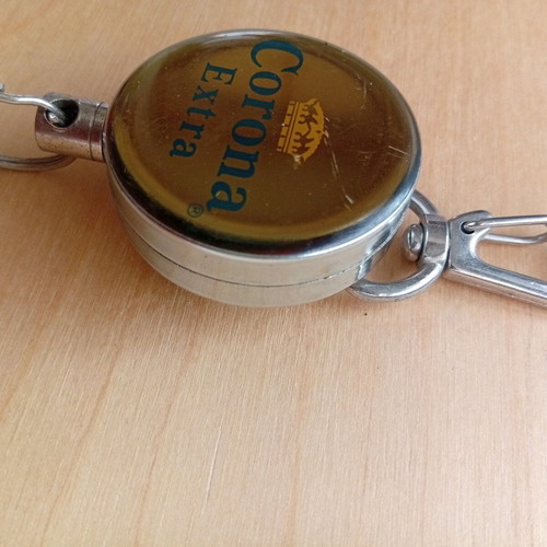 Corona Extra keychain bottle opener used with retractable strap