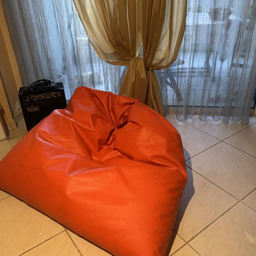 Orange bean bag pouf