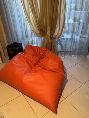 Orange bean bag pouf