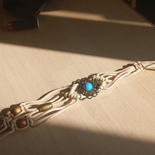 Adjustable belt used, missing one stone