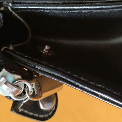 Hunter bag used, black with white stitching