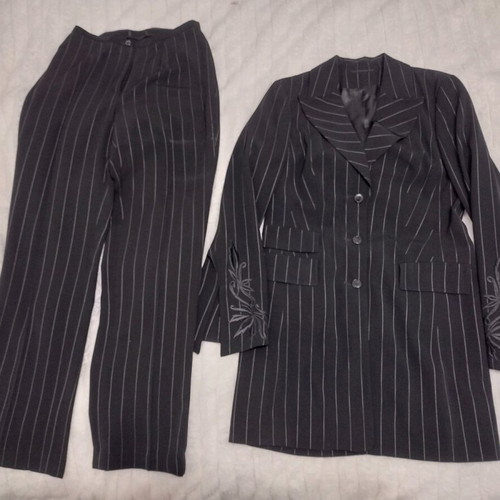 Women's black two-piece suit like new with white pinstripe size M