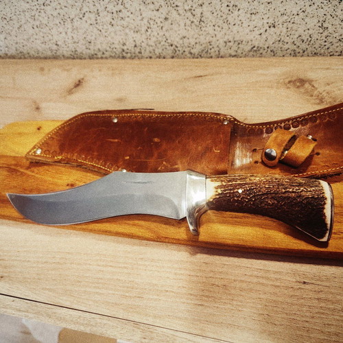 Massive hunting knife new from collection with elk horn handle and calf leather sheath
