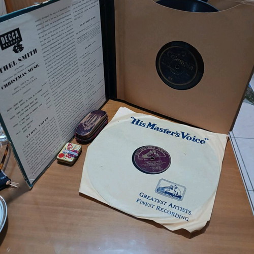 His Master's Voice portable gramophone used with accessories