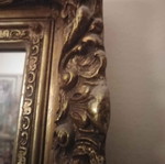 Antique mirror used with carved frame in gold crackle finish