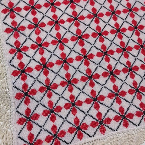 Large embroidered table runner used with handmade lace