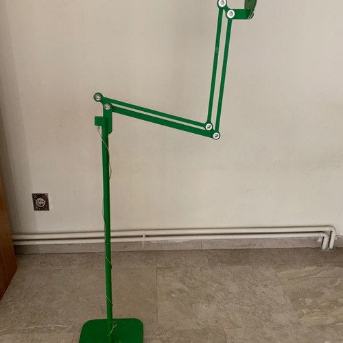 Modern floor lamp used with rotating arm and LED lighting