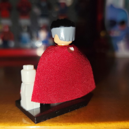 Omni-Man figure like new with base, red cape, and pawn