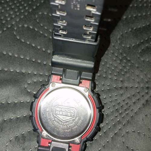 Casio Gshock GA100 watch used, black and red