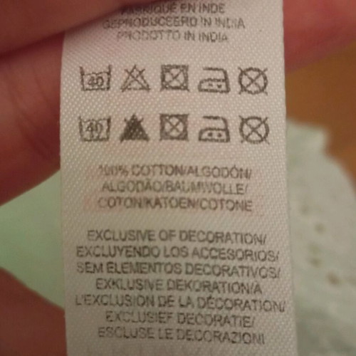 Primark white cotton blouse like new, Large with cut-out designs