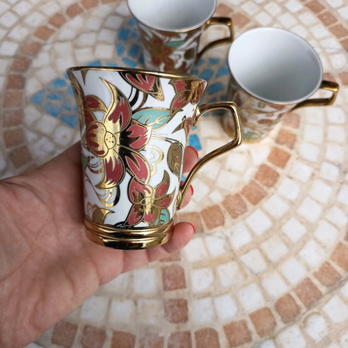 Vintage gold-colored cups used, set of 3