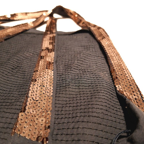 Sleeveless top with sequins and crisscross straps size M