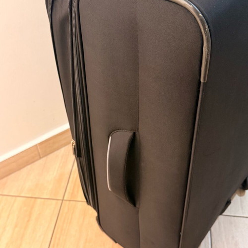 Large wheeled travel suitcase like new, black