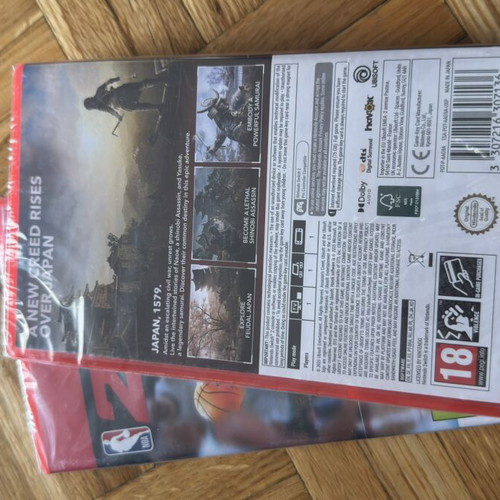 Nintendo Switch 2 games package NBA 2K26 and Assassin's Creed Shadows, sealed