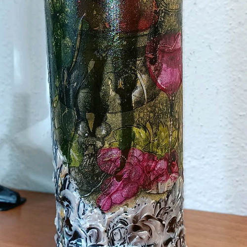 Painted wine bottle used for design