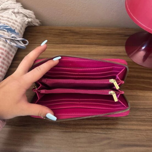 Women's fuchsia wallet like new with zipper and quilted design