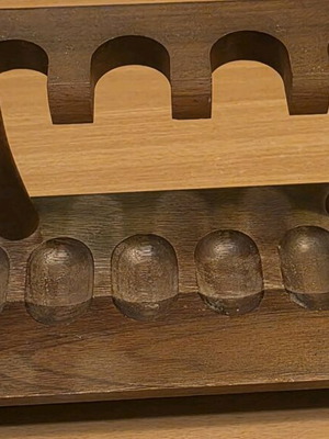 Handmade wooden pipe stand used for six