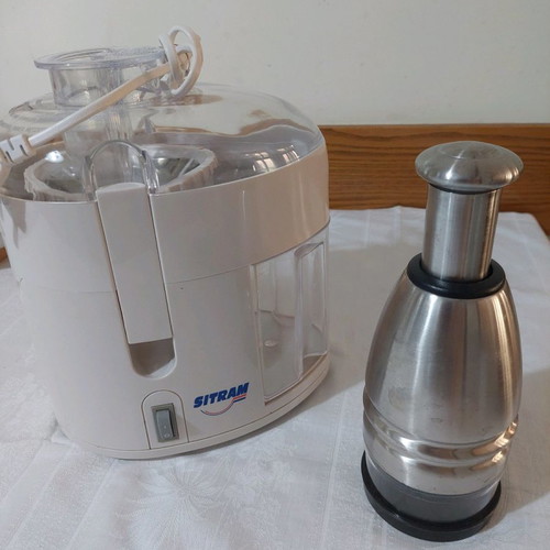 Sitram juicer and metal fruit cutter used