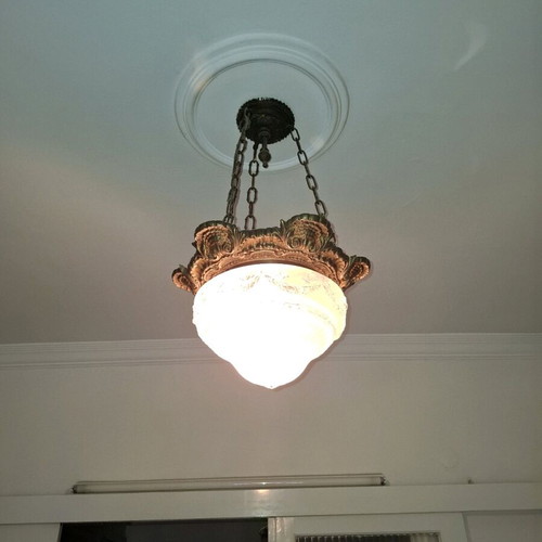 Antique brass ceiling light used with carved glass cover