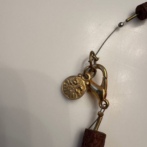 Women's long necklace with lava beads and gold stone like new