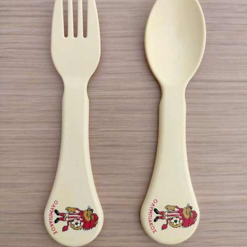 Thrileon baby spoon and fork with Olympiakos mascot, lightly used