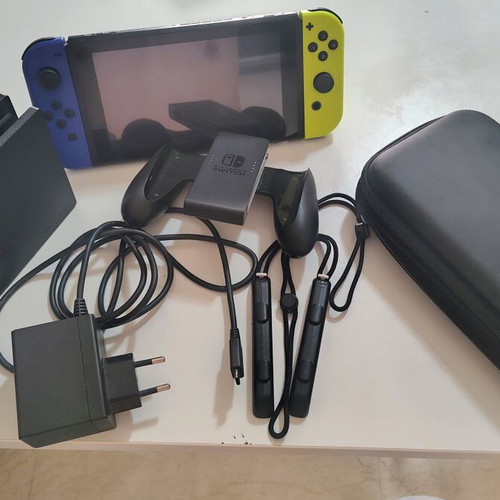 Nintendo Switch console with accessories and carrying case