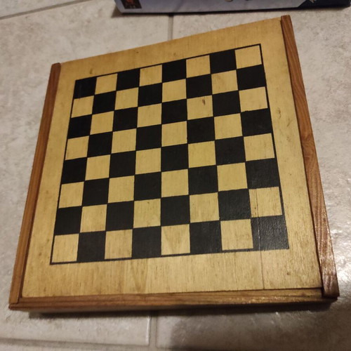 Mini travel chess set used with chess, checkers, backgammon and dominoes