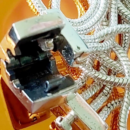 Pandora s925Ale Reflexions bracelet with four strands.