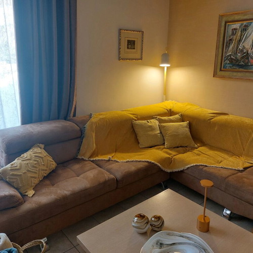 Corner sofa with stain-resistant fabric like new