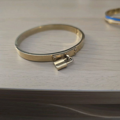 Stainless steel bracelets like new, set of 3, gold and silver colors