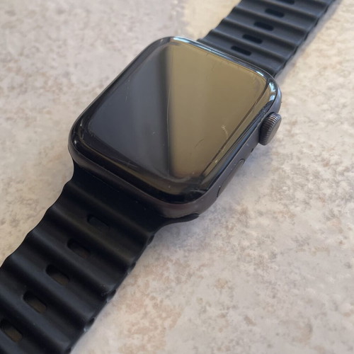 Apple Watch Series 5 44mm with charging cable, straps and screen protectors