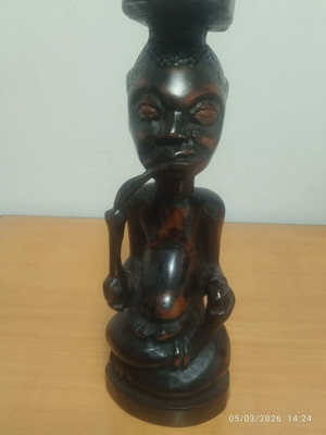 Authentic African wooden carved figurine used