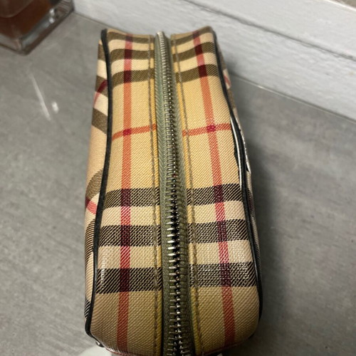 Burberry luxury toiletry bag used with defects