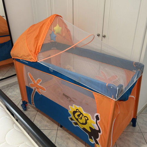 Playpen with changing table, mosquito net & accessories