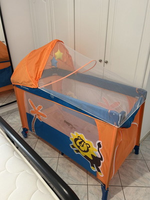 Playpen with changing table, mosquito net & accessories