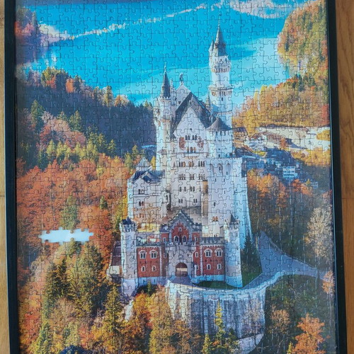 Framed puzzle like new, dimensions 0.53x0.73 m