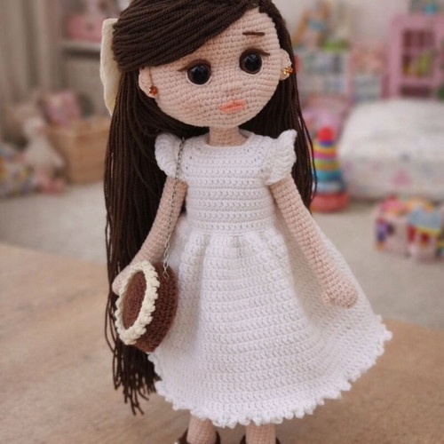 Knitted doll new, handmade