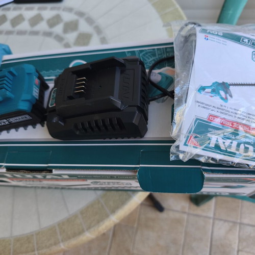 Total cordless hedge trimmer with battery and charger