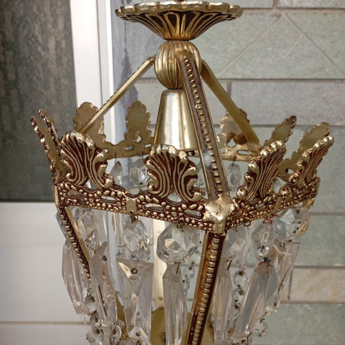 Vintage ceiling light used with brass details