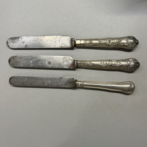 Vintage knives used with silver and silver-plated handles by Christofle and Anowill & Sons Sheffield