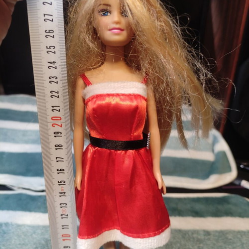 Doll dressed as Santa Claus used