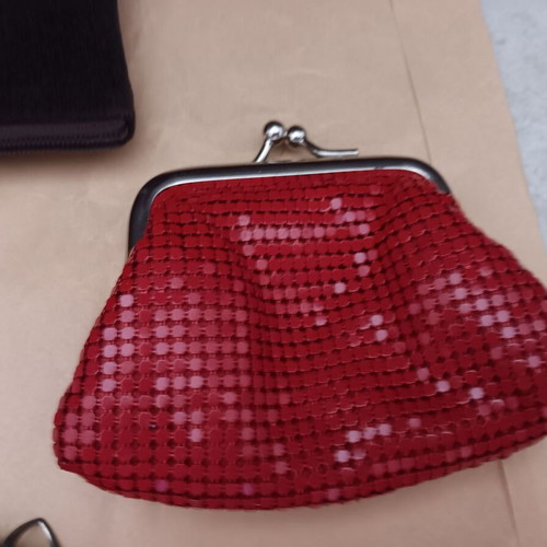 Wallets used, small, multicolored, with non-working zippers