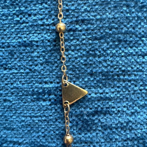 Bracelet for hand or foot like new with triangle detail