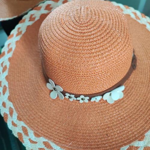 Beach hat like new, orange with flower decoration