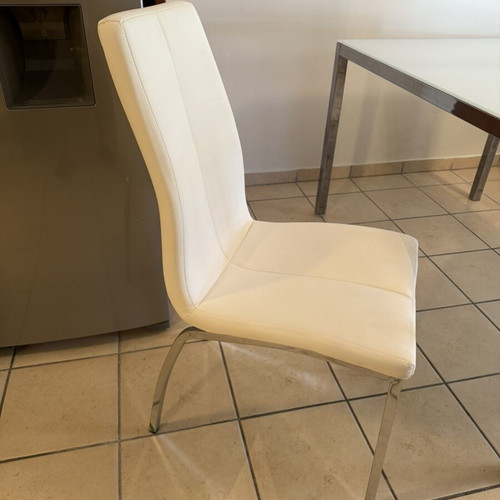 Glass dining table and chair set used, metal frame, white chairs