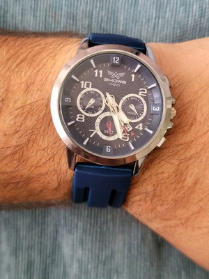 Men's wristwatch like new with blue silicone strap