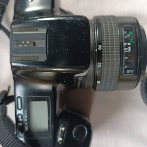 Minolta Maxxum 5000i analog 35mm camera used with 2 lenses