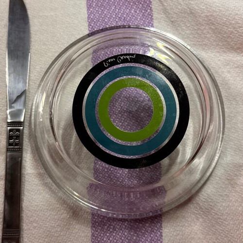 Pierre Cardin glass bowl like new with decorative black and petrol circles