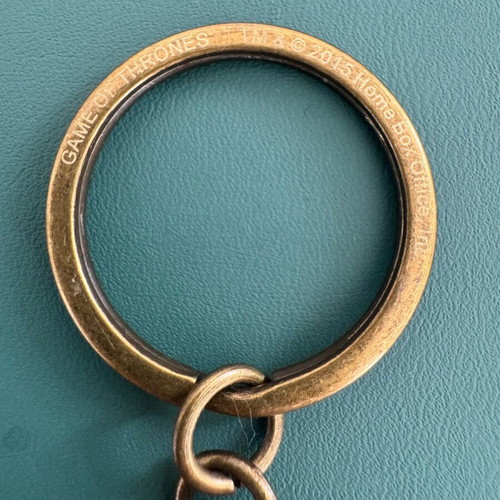 Game Of Thrones Hand of King Abysse keychain like new, multicolor